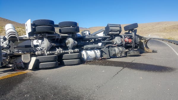 Overturned tractor trailer spills thousands of adult toys onto Oklahoma highway