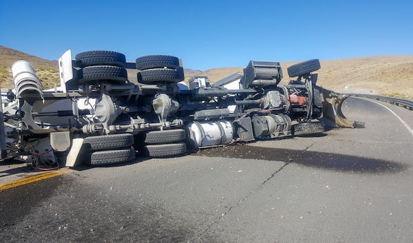 Overturned truck on the highway