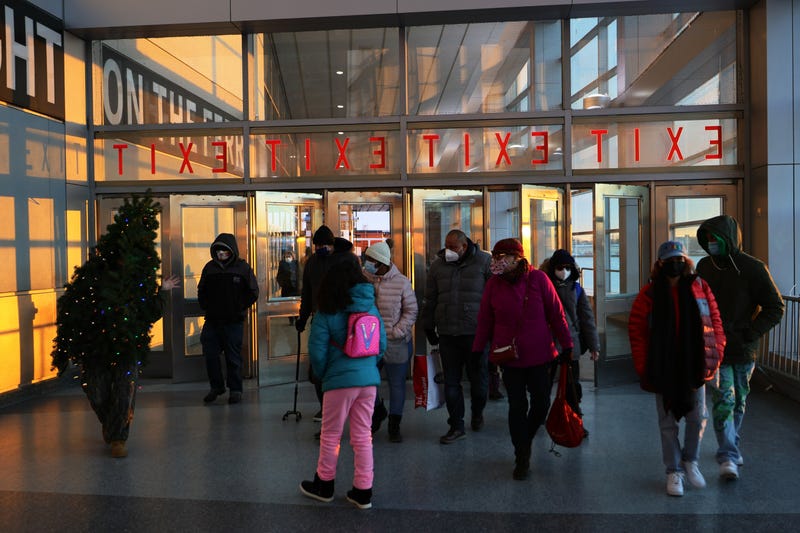 Tommy Liberto waves at people after arriving in NYC wearing a Christmas tree costume on December 18, 2020 in New York City. 