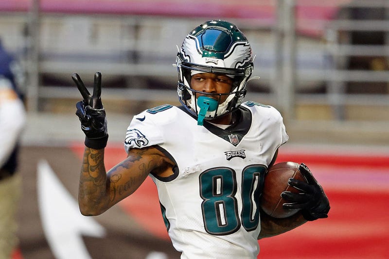Quez Watkins celebrates his first career touchdown against the Cardinals.