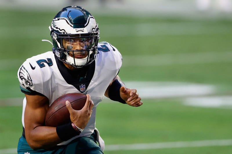 Quarterback Jalen Hurts #2 of the Philadelphia Eagles scrambles with the football against the Arizona Cardinals
