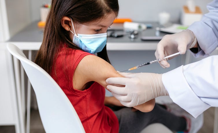 Child getting vaccinated. 