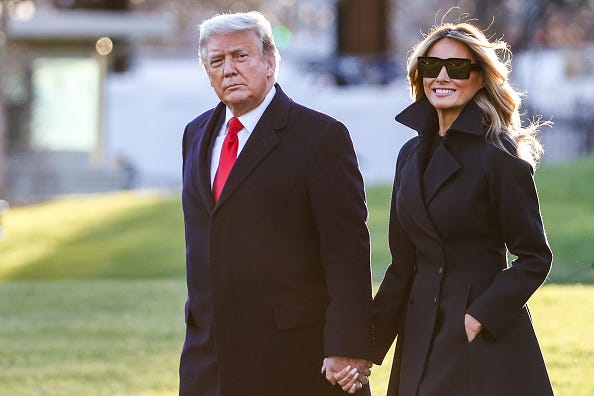 President Donald Trump and first lady Melania Trump walk on the south lawn of the White House on December 23, 2020 in Washington, DC. The Trumps are headed to Mar-a-Lago for the holidays with a government shutdown possible on Monday December 28. 