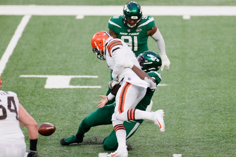 Tarell Basham #93 of the New York Jets sacks Baker Mayfield #6 of the Cleveland Browns for the fumble as John Franklin-Myers #91 of the New York Jets recovers the ball in the fourth quarter at MetLife Stadium on December 27, 2020