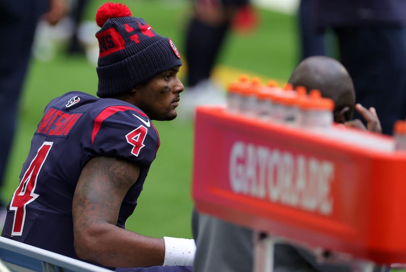 Quarterback Deshaun Watson #4 of the Houston Texans looks on from the bench late in the fourth quarter of the game against the Cincinnati Bengals at NRG Stadium on December 27, 2020 in Houston, Texas.