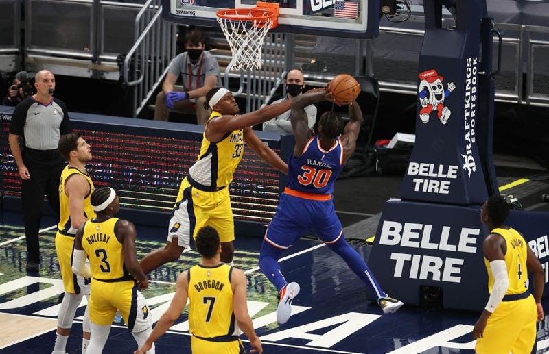 Myles Turner rejects Julius Randle's shot attempt.