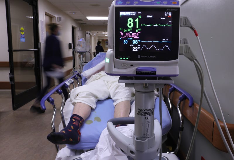 A patient on a stretcher inside a Southern California emergency room.