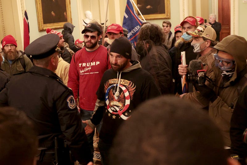 Protesters enter the U.S. Capitol Building on January 06, 2021 in Washington, DC. Congress held a joint session today to ratify President-elect Joe Biden's 306-232 Electoral College win over President Donald Trump. A group of Republican senators said they would reject the Electoral College votes of several states unless Congress appointed a commission to audit the election results.