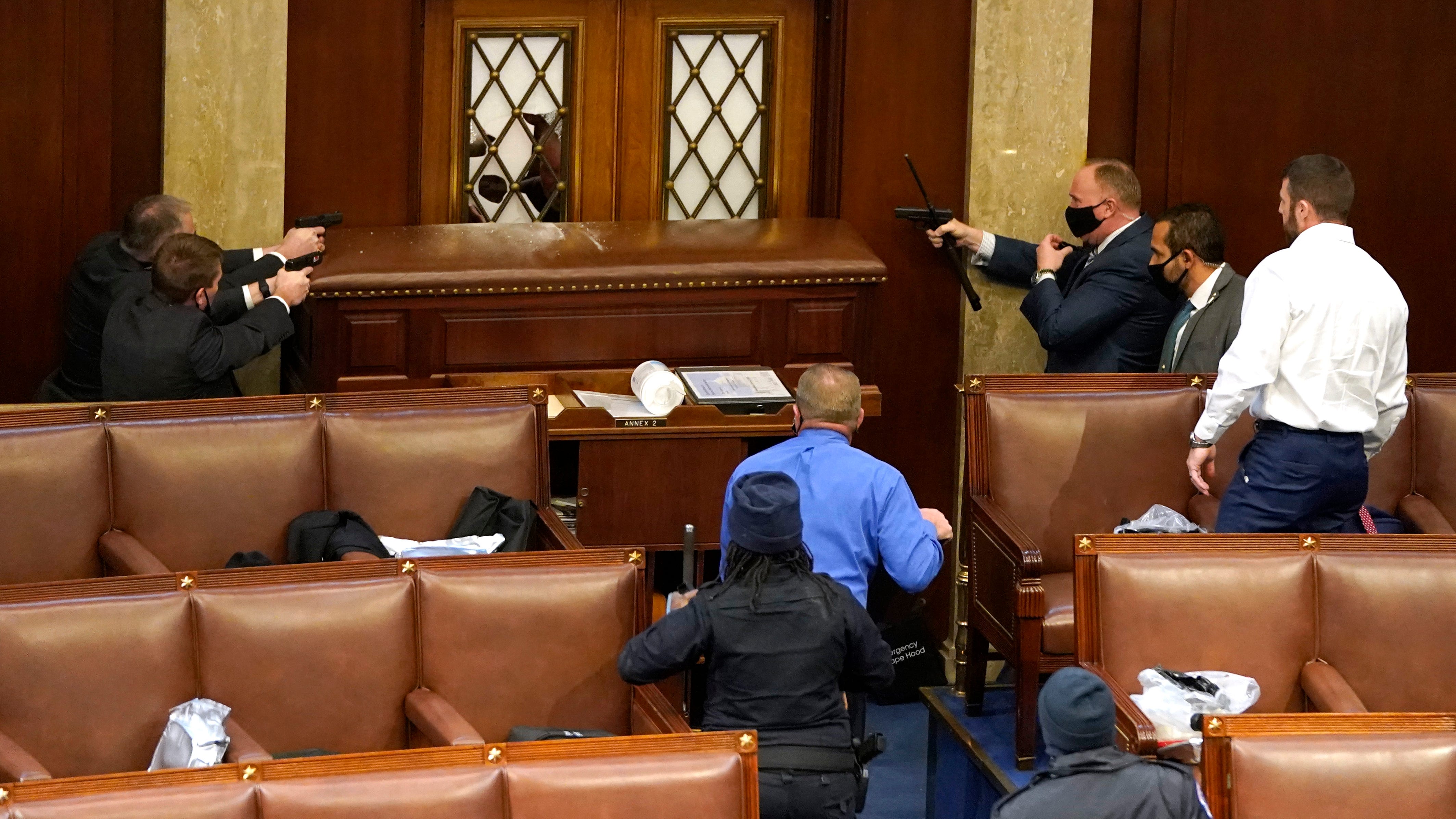 PHOTOS: Armed standoffs, mass arrests as protesters breach US Capitol