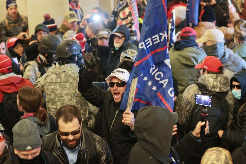 Protesters gather inside the U.S. Capitol Building on January 06, 2021 in Washington, DC. Congress held a joint session today to ratify President-elect Joe Biden's 306-232 Electoral College win over President Donald Trump. A group of Republican senators said they would reject the Electoral College votes of several states unless Congress appointed a commission to audit the election results. (Photo by Win McNamee/Getty Images)