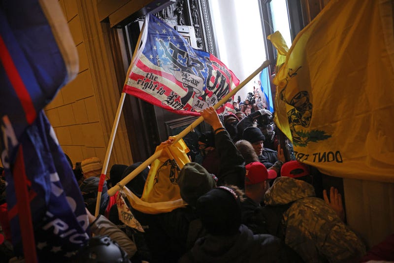 Protesters supporting U.S. President Donald Trump break into the U.S. Capitol on January 06, 2021 in Washington, DC. Congress held a joint session today to ratify President-elect Joe Biden's 306-232 Electoral College win over President Donald Trump. Pro-Trump protesters entered the U.S. Capitol building during demonstrations in the nation's capital. (Photo by Win McNamee/Getty Images)
