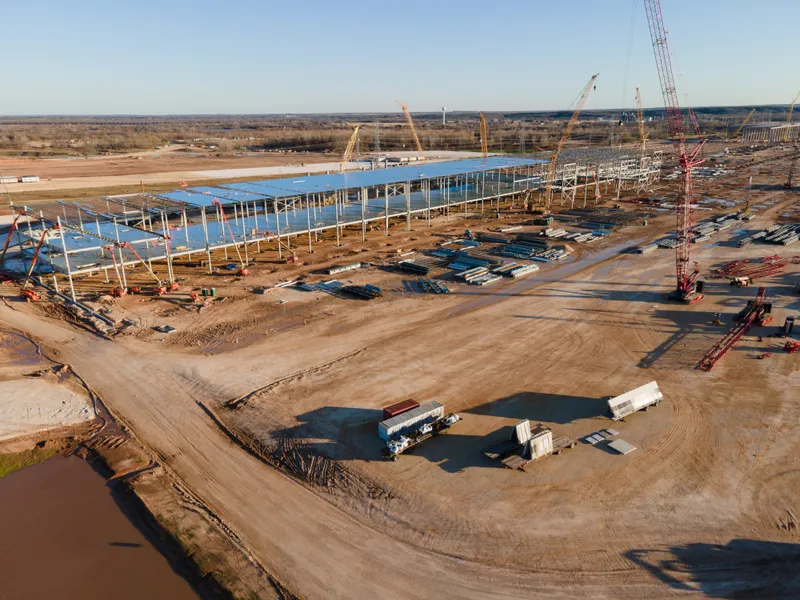 Tesla GigaFactory aerial drone view of Electric Vehicle Battery Factory under construction in Austin, Texas.