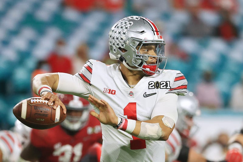 Ohio State quarterback Justin Fields about to attempt a pass.
