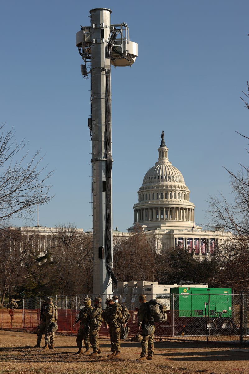 National Guard troops stand watch at the base of a communications tower on the West Front of the U.S. Capitol the day after the House of Representatives voted to impeach President Donald Trump for the second time January 14, 2021 in Washington, DC. Thousands of National Guard troops have been activated to protect the nation's capital against threats surrounding President-elect Joe Biden’s inauguration and to prevent a repeat of last week’s deadly insurrection at the U.S. Capitol. 