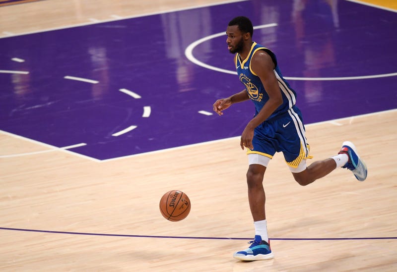 Andrew Wiggins #22 of the Golden State Warriors brings the ball up court during a 115-113 Warrior win over the Los Angeles Lakers on Martin Luther King Jr. Day at Staples Center on January 18, 2021 in Los Angeles, California.