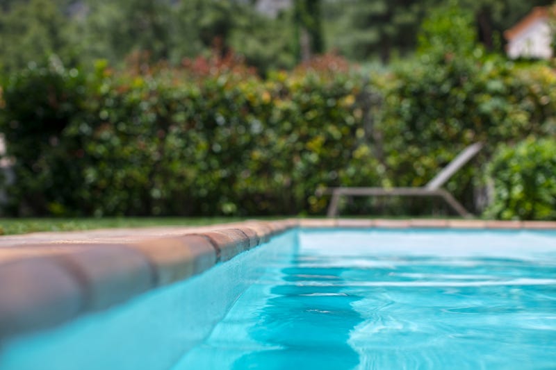 Close-up of a pool's blue water. 