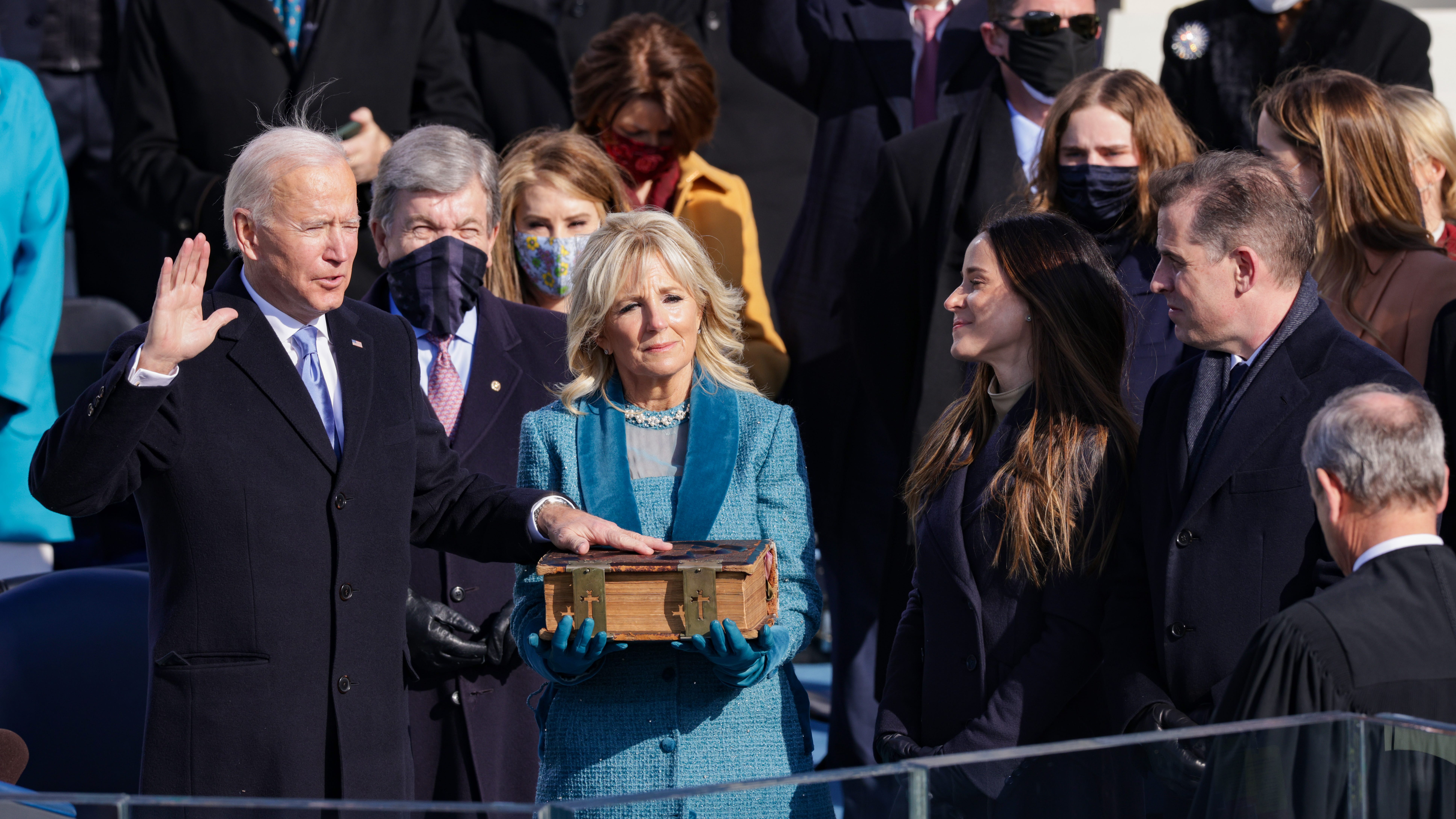 Biden declares ‘democracy has prevailed’ at historically unusual inauguration