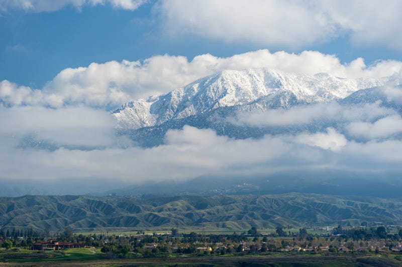 The badlands and Beaumont under the San Bernardino mountains freshly covered by snow