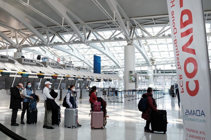 File photo: People wait for a flight at an international terminal at John F. Kennedy Airport (JFK) in January
