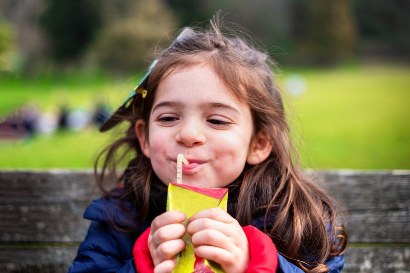 Girl with juice box