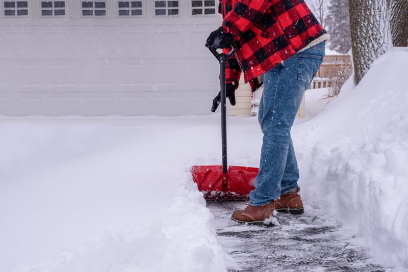 Person shoveling snow