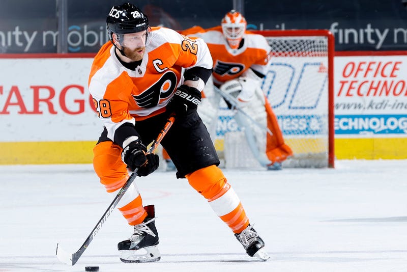 Claude Giroux #28 of the Philadelphia Flyers controls the puck.