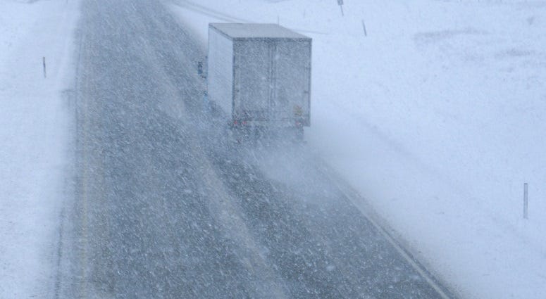 Winter storm leaves blanket of snow and ice over Wichita
