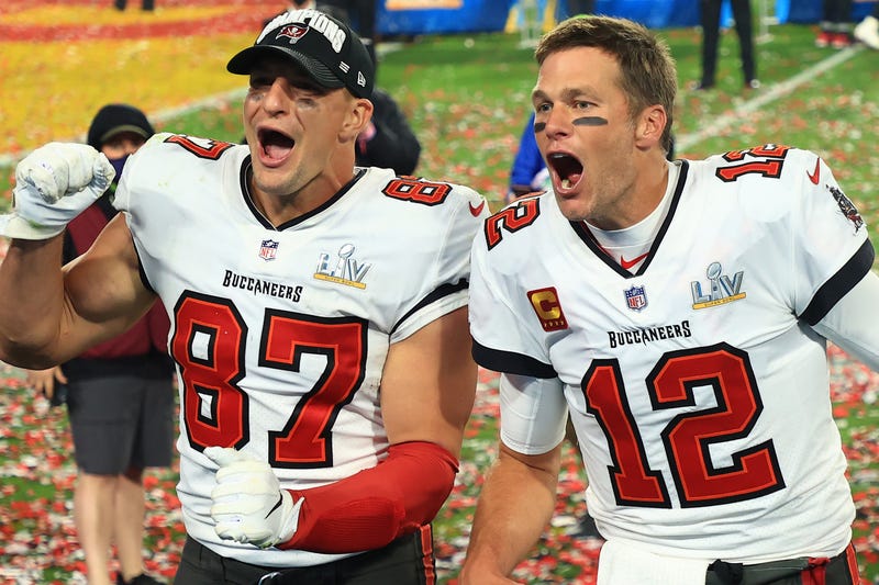 Buccaneers players Tom Brady and Rob Gronkowski celebrate their Super Bowl win.