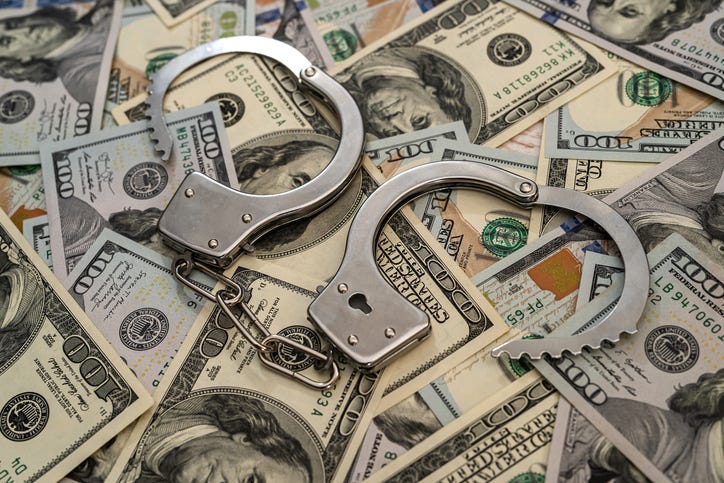 Handcuffs and money. 