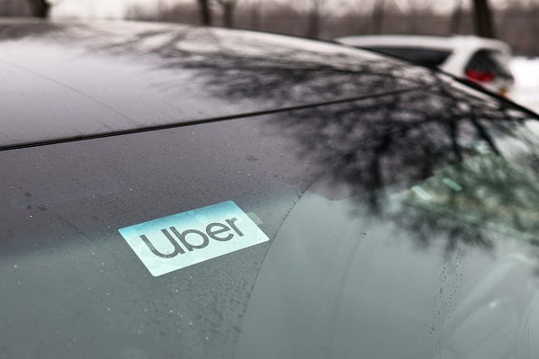 A Uber sticker is seen on a parked car in the Flatbush neighborhood of Brooklyn on February 09, 2021 in New York City.