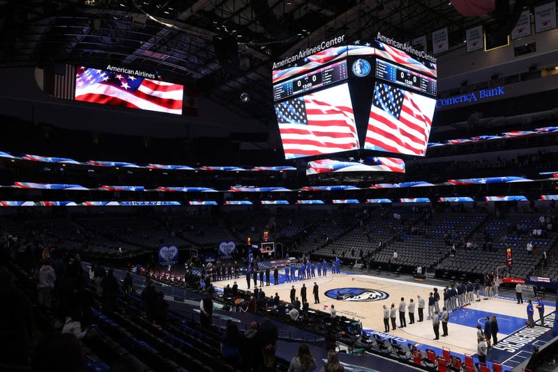 The national anthem is played before a game between the New Orleans Pelicans and the Dallas Mavericks at American Airlines Center in Dallas.