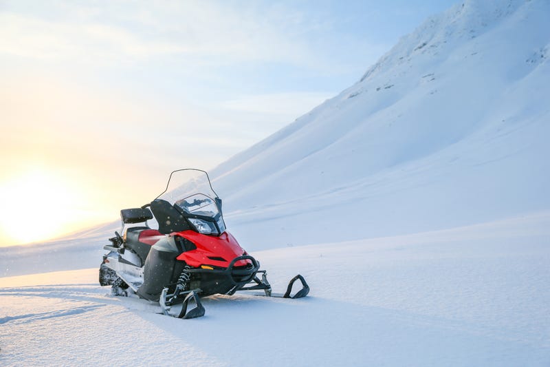 Snowmobile in the snowy mountains