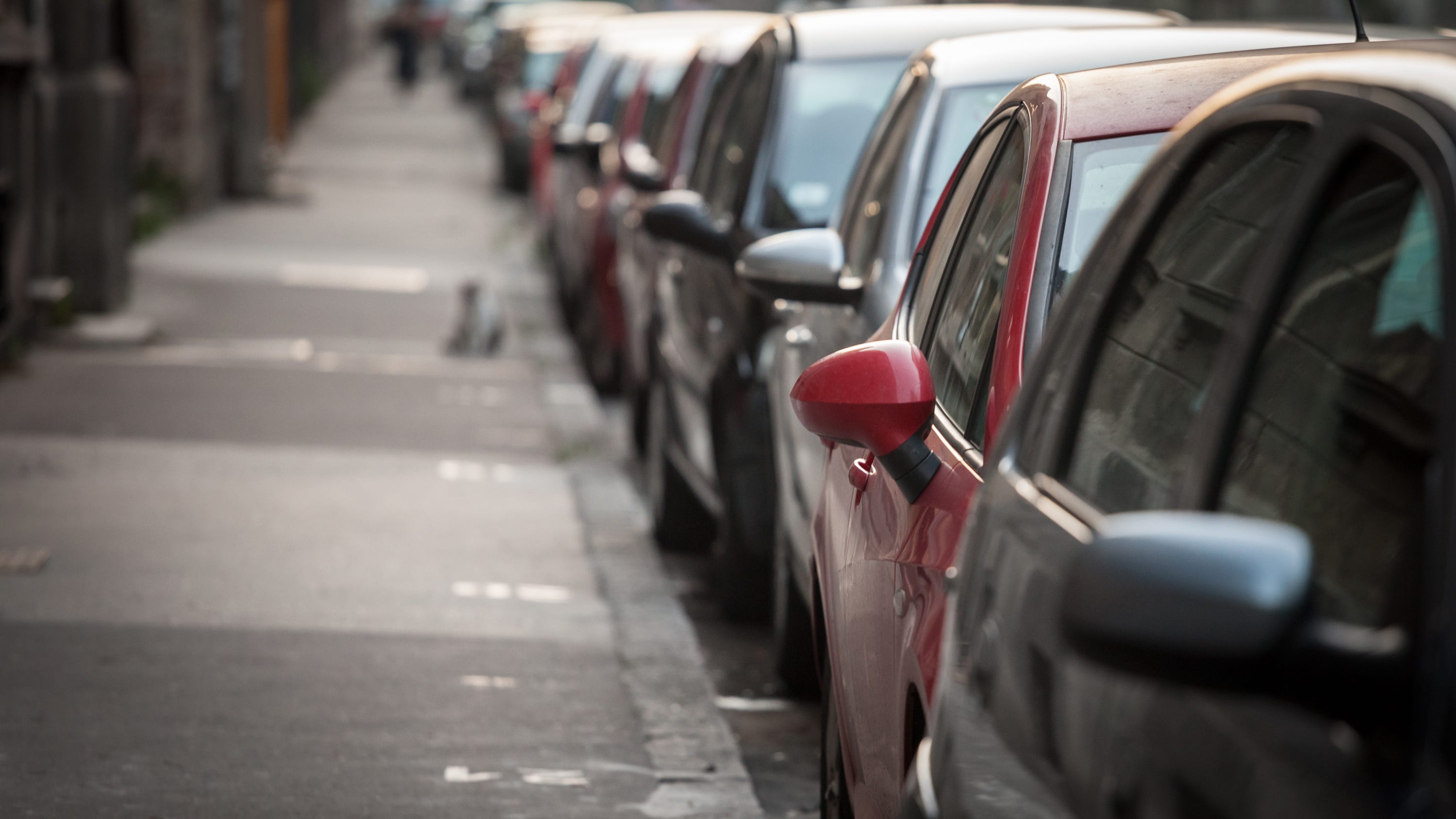 Woman pulls gun on driver who pulled behind her, blocking parallel parking spot in downtown Ann Arbor: police