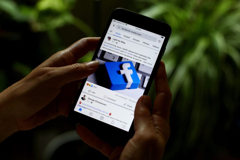 In this photo illustration reports on Facebook's news ban on Australian and International content on February 18, 2021 in Sydney, Australia.