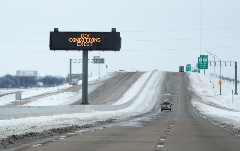 A sign warns of icy conditions on Interstate Highway 35 on February 18, 2021, in Killeen, Texas.
