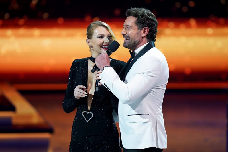 Irina Baeva and Gabriel Soto speak onstage during Univision's 33rd Edition of Premio Lo Nuestro a la Música Latina at AmericanAirlines Arena on February 18, 2021 in Miami, Florida. 