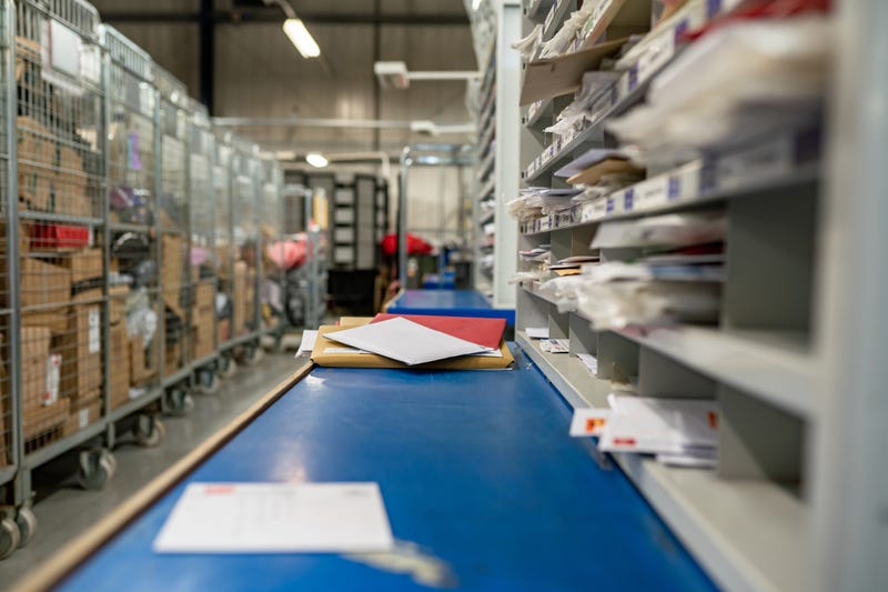 Inside a USPS office.