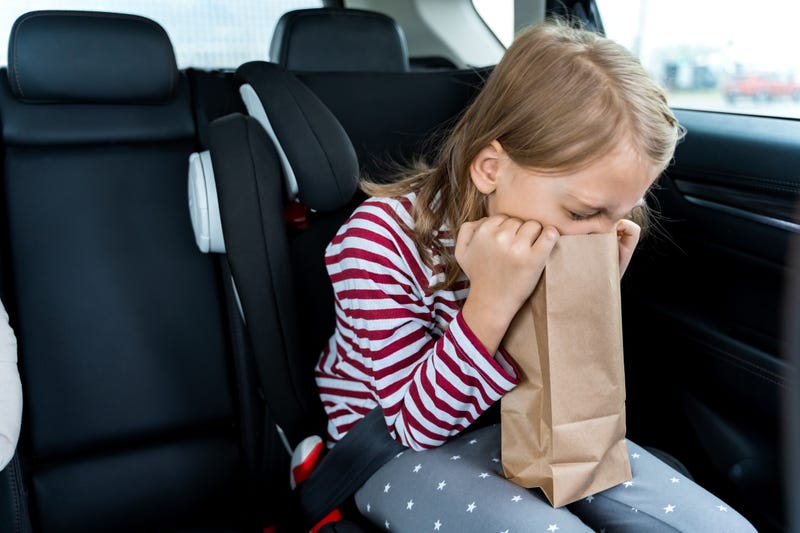 Kid Throwing Up in Car
