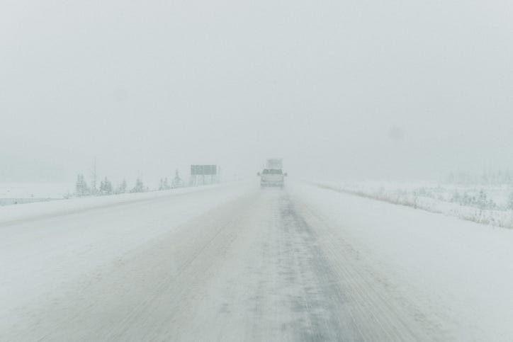 Snow storm on a highway. 