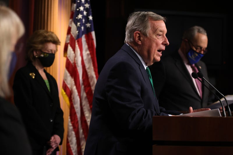 U.S. Senate Majority Whip Sen. Dick Durbin (D-IL) speaks as Sen. Debbie Stabenow (D-MI) and Senate Majority Leader Sen. Chuck Schumer (D-NY) listen during a weekly news conference at the U.S. Capitol on March 2, 2021 in Washington, DC. Senate Democrats held a news conference to answer questions from members of the press.
