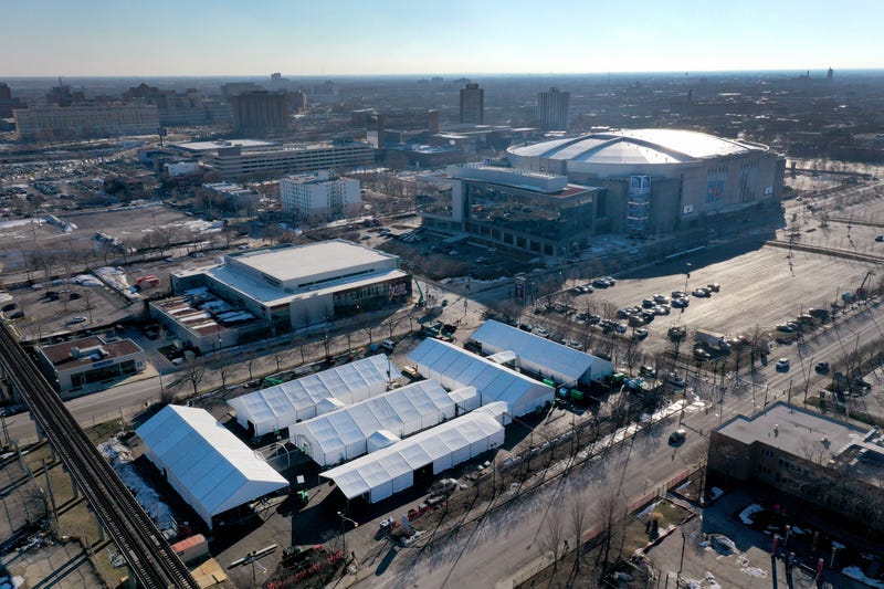An aerial photo shot with a drone shows a COVID-19 vaccination center being constructed in a parking lot at the United Center, home to the NBA Chicago Bulls and NHL Blackhawks, on March 02, 2021 in Chicago, Illinois. The site is projected to distribute 6,000 vaccines-per-day once it begins operation next week.