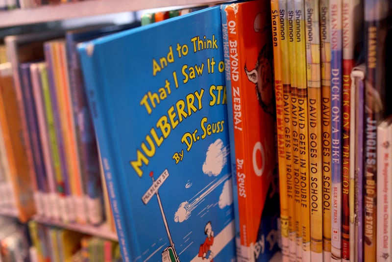 Books by Theodor Seuss Geisel, aka Dr. Seuss, including "On Beyond Zebra!" and "And to Think That I Saw it on Mulberry Street," are offered for loan at the Chinatown Branch of the Chicago Public Library on March 02, 2021 in Chicago, Illinois.
