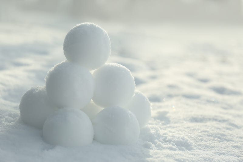 Snowballs on the ground.