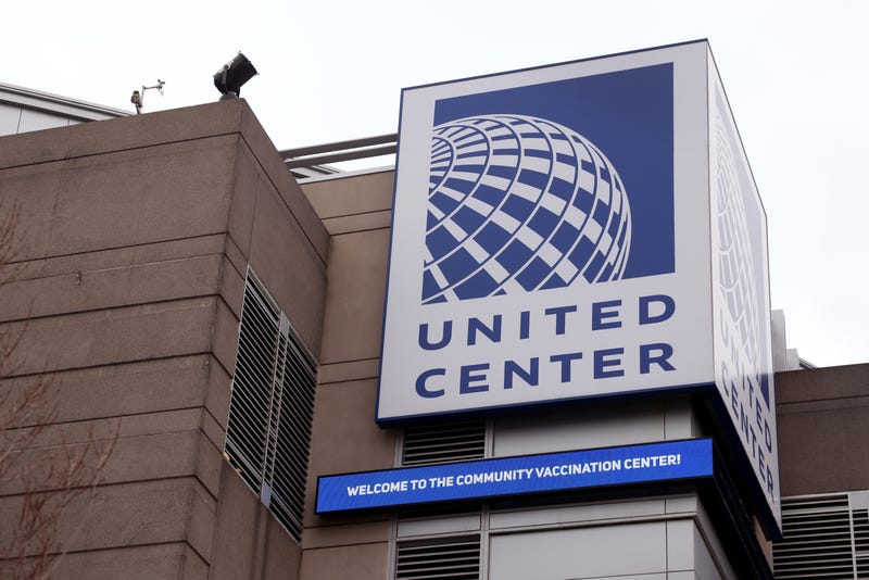 A sign outside of the United Center, home to the Chicago Bulls and Blackhawks, welcomes residents to the mass COVID-19 vaccination site set up in the stadium's parking lot on March 10, 2021 in Chicago, Illinois. The site, which opened at full capacity today, expects to vaccinate 6,000 residents-per-day.