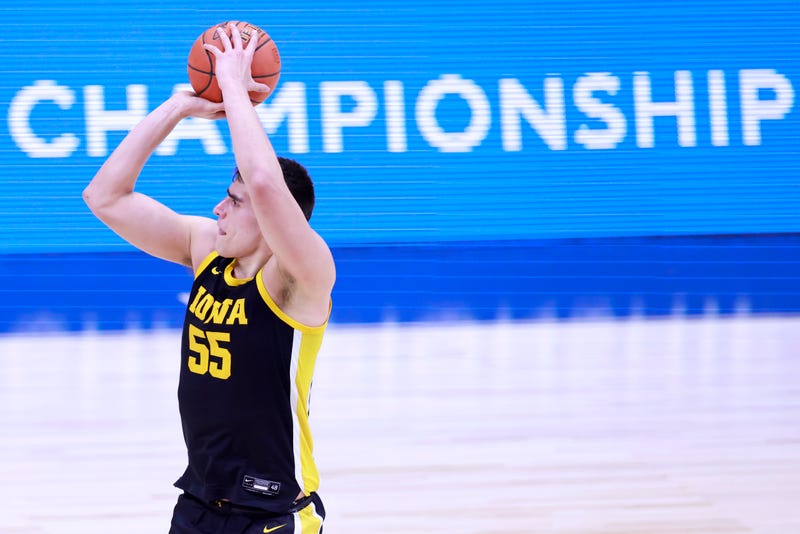 Former Iowa forward Luka Garza shoots a jumper.