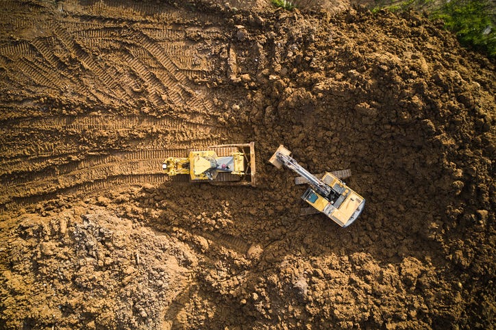 Generic construction site with heavy machinery.