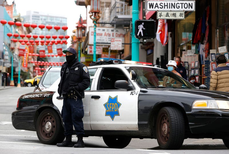 A San Francisco police officer stands guard on Grant Avenue in Chinatown on March 17, 2021 in San Francisco, California. 