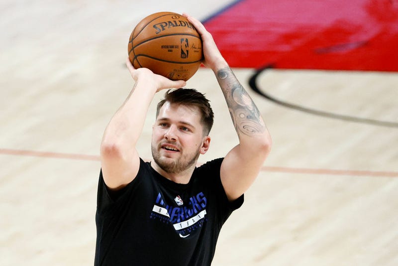 Luka Doncic #77 of the Dallas Mavericks warms up before the game against the Portland Trail Blazers at Moda Center on March 19, 2021 in Portland, Oregon.