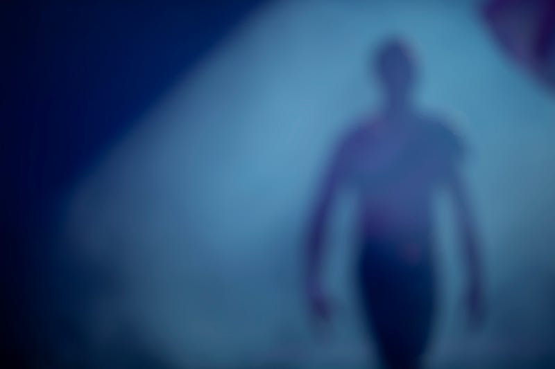 Man in the shadows stock photo