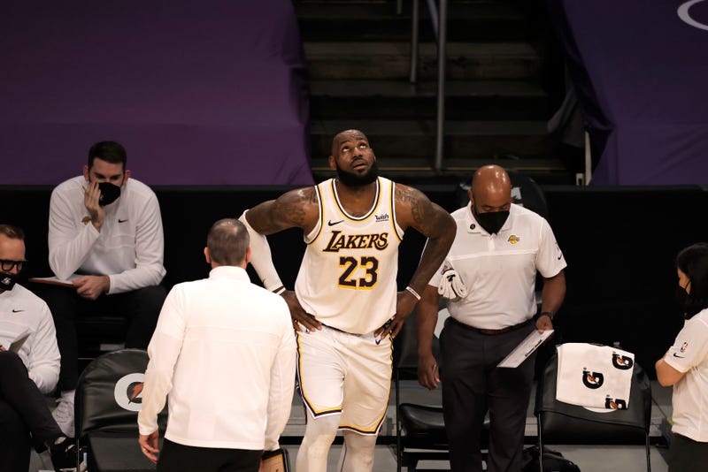 Lakers star LeBron James trying to play through an ankle injury.